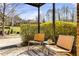 Relaxing outdoor patio featuring comfortable seating and lush green surroundings at 1261 Lavista Ne Rd # E9, Atlanta, GA 30324