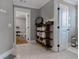 Charming bathroom features a vintage towel rack and built in storage shelves at 2077 Towne Mill Ave, Canton, GA 30114