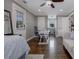 Bedroom with a work desk, ceiling fan, and hardwood floors at 2077 Towne Mill Ave, Canton, GA 30114