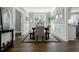 Bright dining room displays hardwood floors, wainscoting, and neutral-toned furniture at 2077 Towne Mill Ave, Canton, GA 30114
