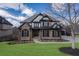 Charming two-story home featuring stone facade and manicured front lawn and inviting curb appeal at 2077 Towne Mill Ave, Canton, GA 30114