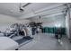 Spacious garage featuring a treadmill, exercise equipment, and ample storage space at 2077 Towne Mill Ave, Canton, GA 30114