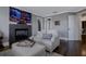 Bright living area showcasing a modern fireplace, plush seating, and stylish decor at 2077 Towne Mill Ave, Canton, GA 30114