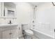 A functional bathroom with a classic white vanity, standard tub-shower combination, and essential amenities at 7316 Caribou Trl, Riverdale, GA 30296