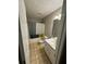 Cozy bathroom with neutral colors, vanity, and shower-tub combination at 1007 Billy Mcgee Rd, Lawrenceville, GA 30045