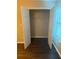 Bedroom closet with double doors, offering convenient storage space for clothes and personal items at 1007 Billy Mcgee Rd, Lawrenceville, GA 30045