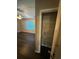 Bright bedroom featuring a window and ceiling fan next to the closet, ideal for relaxation and restful nights at 1007 Billy Mcgee Rd, Lawrenceville, GA 30045