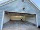 Open garage featuring finished walls and a concrete floor at 1007 Billy Mcgee Rd, Lawrenceville, GA 30045