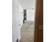 View into the garage with concrete floors at 1007 Billy Mcgee Rd, Lawrenceville, GA 30045