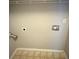 Functional laundry room ready for washer and dryer hookups, designed for convenience at 1007 Billy Mcgee Rd, Lawrenceville, GA 30045