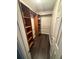 Spacious walk-in closet with wooden shelving and ample storage, perfect for organizing clothes and accessories at 1007 Billy Mcgee Rd, Lawrenceville, GA 30045