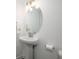 Bathroom with pedestal sink, oval mirror, and tile floors at 1312 Stanley Park Dr, Decatur, GA 30033