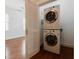 Convenient laundry area featuring a stacked washer and dryer at 338 Clifford Ne Ave, Atlanta, GA 30317