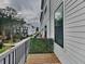 Balcony with wood flooring, a privacy screen and an exterior view of the neighborhood at 2461 Sycamore Nw Rd, Atlanta, GA 30318