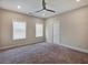 Bedroom featuring a ceiling fan, carpeted floors and natural light at 2461 Sycamore Nw Rd, Atlanta, GA 30318