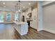 Modern kitchen with an island, stainless steel appliances, and sleek cabinets at 2461 Sycamore Nw Rd, Atlanta, GA 30318