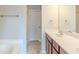 Neutral bathroom featuring a sink, bath and shower at 2819 Hillside Way, Decatur, GA 30034