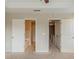Open bedroom featuring an open door to the ensuite and stairs at 2819 Hillside Way, Decatur, GA 30034