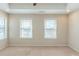 Carpeted bedroom featuring bright windows and recessed lighting at 2819 Hillside Way, Decatur, GA 30034