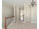 Open hallway with carpet flooring, a chandelier, and views leading to the kitchen and other living areas at 2819 Hillside Way, Decatur, GA 30034