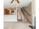 Open-concept living area featuring stairs, kitchen and fireplace at 2819 Hillside Way, Decatur, GA 30034