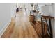 Inviting hallway with hardwood flooring, console table, and stylish decor, leading into the home at 514 Cunninghame Ct, Peachtree City, GA 30269