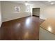 Large basement with vinyl floors, neutral walls, a closet and bright light from two windows at 5281 Brookshire Ct, Douglasville, GA 30135