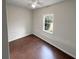 Cozy bedroom with warm wood floors and a bright window at 5281 Brookshire Ct, Douglasville, GA 30135