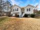 Charming two-story home featuring stone accents and a well-maintained front lawn at 5281 Brookshire Ct, Douglasville, GA 30135