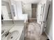 Main bathroom with double vanity, separate shower, and bathtub at 5281 Brookshire Ct, Douglasville, GA 30135