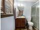 Bathroom features a single sink vanity and shower with glass enclosure and light blue walls at 6325 S Summers S Cir, Douglasville, GA 30135