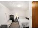 Bedroom featuring carpeted floors, a bench, and white bedding at 6325 S Summers S Cir, Douglasville, GA 30135