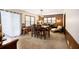 Inviting dining room with a wood table, carpet flooring, and natural light at 6325 S Summers S Cir, Douglasville, GA 30135