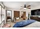 Spacious main bedroom with ample closet space and a comfortable seating area with neutral color scheme at 6325 S Summers S Cir, Douglasville, GA 30135