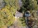 Aerial view of the home surrounded by mature trees, highlighting its location within a leafy, established neighborhood at 1824 Evans Sw Dr, Atlanta, GA 30310
