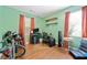 Bedroom with a desk, dark wood floors, and a window for plenty of natural light at 1824 Evans Sw Dr, Atlanta, GA 30310