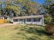 Charming single story house featuring a well-manicured lawn and beautiful curb appeal at 1824 Evans Sw Dr, Atlanta, GA 30310