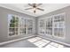 This sun-drenched bedroom features two large windows offering lots of natural light at 504 Mill Pond Ct, Smyrna, GA 30082