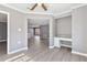 A bedroom, featuring new flooring, neutral paint, and a convenient built-in desk at 504 Mill Pond Ct, Smyrna, GA 30082