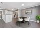 Bright dining area featuring a round table with seating for four, adjacent to the modern kitchen at 504 Mill Pond Ct, Smyrna, GA 30082