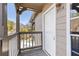 Charming entrance with a white front door and a balcony overlooking a peaceful scene at 504 Mill Pond Ct, Smyrna, GA 30082