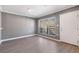 Spacious living room featuring a large window that offers lots of natural light at 504 Mill Pond Ct, Smyrna, GA 30082