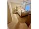 Bedroom with upholstered bed frame and a ceiling fan at 1044 Mariners Ct, Stone Mountain, GA 30083