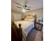 Bedroom featuring an upholstered bed frame, night stands and lamps at 1044 Mariners Ct, Stone Mountain, GA 30083