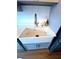 Kitchen features a modern farmhouse sink with a stylish faucet and quartz countertops at 1044 Mariners Ct, Stone Mountain, GA 30083