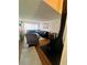 Spacious living room with cozy seating area, modern fireplace, and wood floors at 1044 Mariners Ct, Stone Mountain, GA 30083