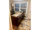 Office space featuring a large desk and natural light from a window at 1044 Mariners Ct, Stone Mountain, GA 30083