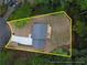 Aerial view of home with a driveway and property lines. *Property lines do not represent an actual survey at 1920 Rocky Mill Ln, Lawrenceville, GA 30044