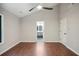 Large bedroom with vaulted ceiling, hardwood floors, and ensuite bathroom at 1920 Rocky Mill Ln, Lawrenceville, GA 30044