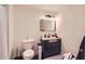 Modern bathroom with updated fixtures, vanity and toilet at 3619 Elinburg Ne Ct, Buford, GA 30519